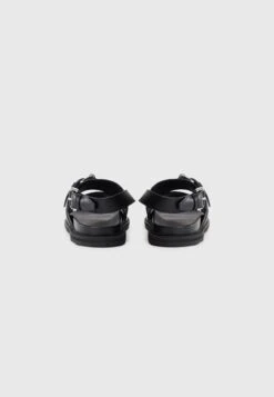 MOSCHINO Sandals - Nero 14 MOSCHINO Sandals - Nero -Stock X 03195f250dfe424db224c98641540eab