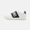 MOSCHINO Slip-Ons - Black/White -Stock X 04bd311958724b0fbd8e8fbb2e2d2052
