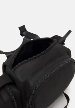 Rains Trail Unisex - Across Body Bag - Black -Stock X 0555c38fddda4d96b5da6f39f09b118f