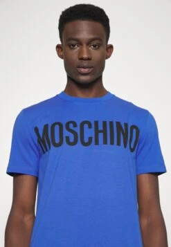 MOSCHINO Print T-Shirt - Fantasy Blue 17 MOSCHINO Print T-Shirt - Fantasy Blue -Stock X 0634ee855ecc4a009335d00b69f9d9ad