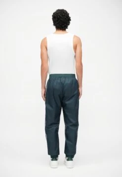 EA7 Emporio Armani TRAIN GRAPHIC SERIES PANTS MONOGRAM - Tracksuit Bottoms - Dark Green Fancy -Stock X 085e44bc836e4ef2b638283397300d14