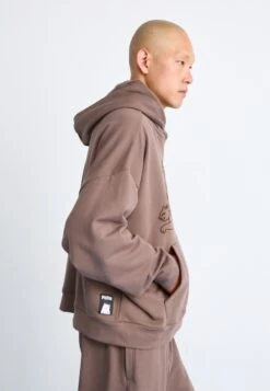 Puma X RIPNDIP BOXY GRAPHIC TR - Hoodie - Flat Bronze -Stock X 099333732a8b44ca9e102e956e5b8e89