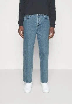 Filippa K Baggy Tapered Jeans - Jeans Tapered Fit - Allover Stone