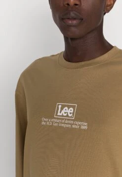 Logo Loose Tee Unisex - Long Sleeved Top - Ammonite -Stock X 0ea843f571d445c7bdbb1031c79be837