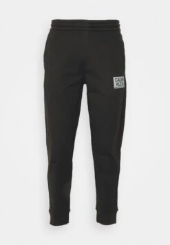 Calvin Klein Gloss Stencil Logo Jogger - Tracksuit Bottoms - Ck Black -Stock X 0f3c7da2938746ce81ca41ac79b39ebc