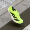 ADIDAS PERFORMANCE ADIZERO TAKUMI SEN 11 - Road Running Shoes - Lucid Lemon/core Black/halo Silver-coloured