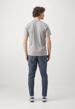 ADIDAS PERFORMANCE FC BAYERN MUENCHEN TIRO25 COMPETITION VIS TECH TRAVEL PANT - Club Wear - Bold Onix/easy Coral -Stock X 14f8e65829654424876b0e2258050ac4