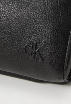 Calvin Klein STRAP WAISTBAG - Bum Bag - Black -Stock X 172be476cd4c46b2b8e2028af3f6ce2f