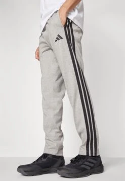 Adidas Sportswear ESSENTIAL THREE STRIPES SINGLE - Tracksuit Bottoms - Medium Grey Heather/black 12 Adidas Sportswear ESSENTIAL THREE STRIPES SINGLE - Tracksuit Bottoms - Medium Grey Heather/black -Stock X 186b0282f4914d4d8657c06f27294531