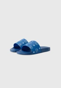MCM Pool Slides - Blue Visetos -Stock X 18b9095423e445cb9b3ef3ba82366a24