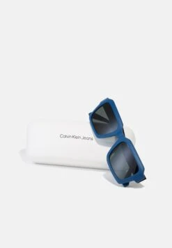 Calvin Klein Jeans Unisex - Sunglasses - Blue -Stock X 19bfbb1b8ac347bea66b8e8fcb017949