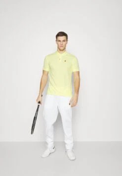 Nike Performance Heritage Slim - Polo Shirt - Lemon Chiffon -Stock X 22128a1867674dcd905a779f65ca160e