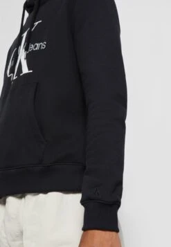 Calvin Klein Jeans Core Monogram Hoodie - Sweatshirt - Black -Stock X 22f452d744c84615a672b66fb782fd29
