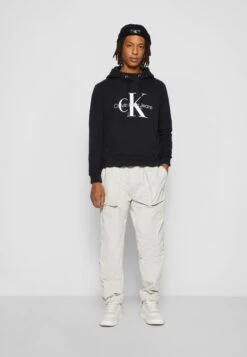 Calvin Klein Jeans Core Monogram Hoodie - Sweatshirt - Black -Stock X 271465fb66fa46d2afe87e60a2fd0f6e