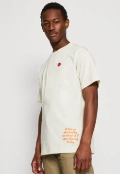 Reborn Loose With Embroidery At Back - Print T-Shirt - Buttercream -Stock X 2964d885134c46548af52112e2e9e76b