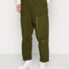 Flight Trouser - Cargo Trousers - Dark Olive -Stock X 2c28f3af47834622adeee74a575f7e52