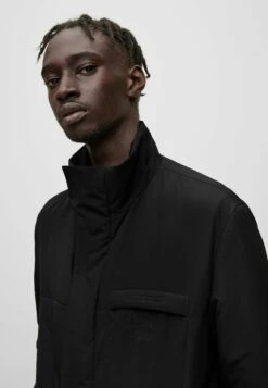 Hugo Mio - Winter Coat - Black One -Stock X 2ffab5ce007a432c9d02d2efc1db5285