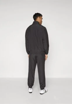 Puma ACM FANSUIT SET - Club Wear - Black/for All Time Red -Stock X 32946b86cb52469a8e5beb46a71a15ac