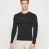 Champion Seamless Long Sleeve - Long Sleeved Top - Black -Stock X 33e4362c417d4075abd2b4c3a4309b3e