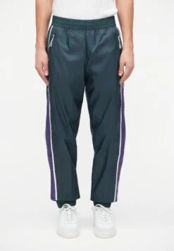 EA7 Emporio Armani TRAIN GRAPHIC SERIES PANTS MONOGRAM - Tracksuit Bottoms - Dark Green Fancy