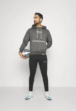 Nike Performance Liverpool Fc Standard Issue Hoodie - Sweatshirt - Charcoal Heather/Pale Ivory -Stock X 3bd8cf59e4d7472185363506af650c7f