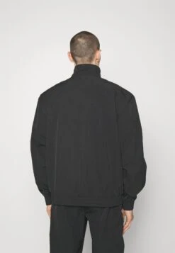 Han Kjøbenhavn Nylon Oversized Track Top - Training Jacket - Black -Stock X 3f07fb707e154521a9165c5294a59272