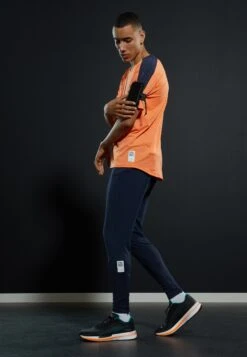 Puma Run First Mile - Tracksuit Bottoms - Parisian Night