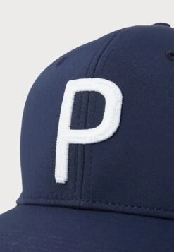 PUMA Golf HERITAGE P TECH CAP - Cap - Deep Navy -Stock X 409bb6e89c994177b0157ab1db927dda