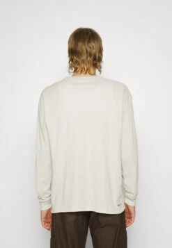 Nike Sportswear Tee - Long Sleeved Top - Light Bone 14 Nike Sportswear Tee - Long Sleeved Top - Light Bone -Stock X 4192e606b6b9458d9e5bd6d3c49cc686