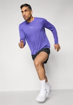 Salomon SHKOUT CORE TEE - Long Sleeved Top - Liberty -Stock X 419f9d82e57443e6aca9ef11abcce181