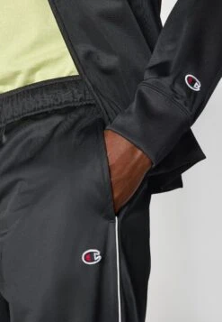 Champion TRACKSUIT LARGE LOGO SET - Tracksuit - Black -Stock X 43668722cccd4fe48bdf0beffbb8e698