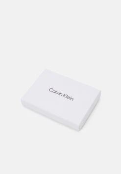 Calvin Klein Median Holder Zip Unisex - Wallet - Black -Stock X 44790f87a1914534a676614bccd27385