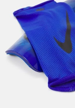 Nike Performance Mercurial Lite Unisex - Shin Pads - Baltic Blue/Photo Blue/Black -Stock X 48a086e55ea74c598cbef7f37ecc8d3f