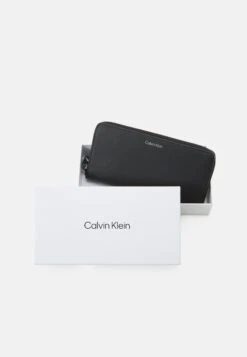 Calvin Klein Concise Unisex - Wallet - Black -Stock X 4a60d7a719de4b96b4e508f9a3aa4a18