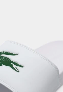 Lacoste SERVE SLIDE 125 - Mules - White/green -Stock X 4ec5d9c4747047d6990b24e2a3df5e60