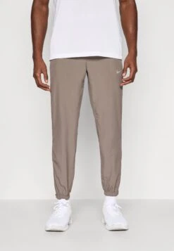 Nike Performance FORM PANT - Tracksuit Bottoms - Cave Stone/black/reflective Silver-coloured