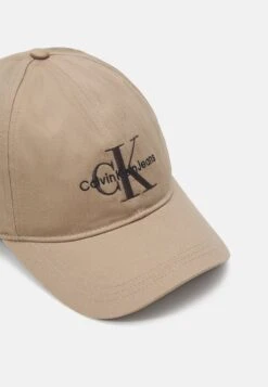 Calvin Klein Jeans Monogram Unisex - Cap - Truffle -Stock X 5695a93e5c6149639621fc9b53784436