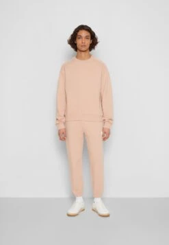 Cropped Crewneck - Sweatshirt - Rugby Tan -Stock X 5f38301d559a46179398a7d90f2f23f7