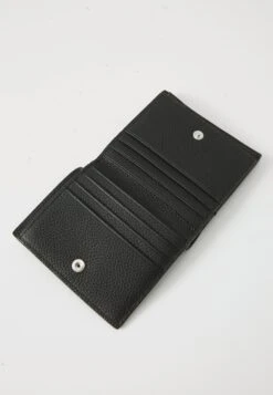 Calvin Klein SLIM TRIFOLD CARD - Wallet - Black -Stock X 5f41188fc33c45da9cd8b9412111e775