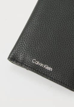 Calvin Klein SLIM TRIFOLD CARD - Wallet - Black -Stock X 611c95b90f3b4d51bdb6816e00d3c1e5