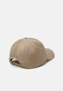 Calvin Klein Jeans Monogram Unisex - Cap - Truffle -Stock X 61532edd8aac43768b317c43b66ed990