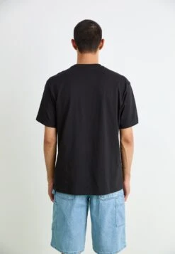 Puma GRAPHIC SUPER WORLD TOUR RELAXED - Print T-shirt - Black -Stock X 659da1748c994964a3ee168f6ee2774f