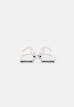 Calvin Klein Jeans T-Bar Sandals - Bright White/Black -Stock X 673a6833d5ea4a8ea5d40f5271f3c861