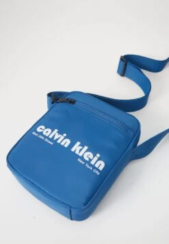 Calvin Klein Jeans GRAPHIC REPORTER - Cross Body Bag - Dark Blue -Stock X 68a6258b12a9451aa5df15394c76d2cd