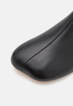 MM6 Maison Margiela Ankle Boot - Classic Ankle Boots - Black -Stock X 6f34a1ef5c5a4fb89bff6e01760b5e1e