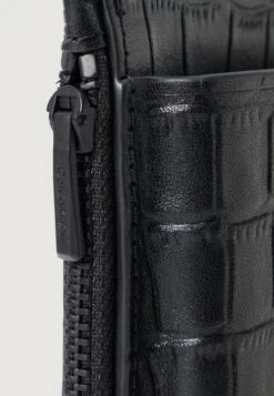 Calvin Klein PHONE CROSSBODY - Phone Pouch - Black 9 Calvin Klein PHONE CROSSBODY - Phone Pouch - Black -Stock X 6f5c439dc1ea4aeaac27b481ea33f33c