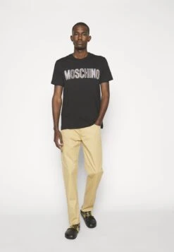 MOSCHINO Trousers - Trousers - Beige -Stock X 7562b8fcbaf24b26b0564738d6dd4c14