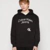 Calvin Klein Jeans Curved Stacked Logo Hoodie - Hoodie - Black -Stock X 77f39b24745840359e0fa76480886d48