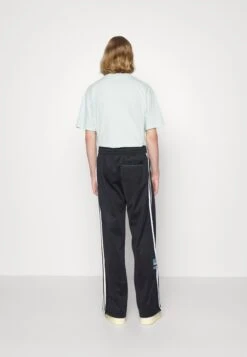 Adidas Originals Track Pants Unisex - Tracksuit Bottoms - Black 12 Adidas Originals Track Pants Unisex - Tracksuit Bottoms - Black -Stock X 7aad9d1e784e4ed3a5c012c8c1a551c6