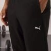 Puma ESSENTIALS TAPERED PANT - Tracksuit Bottoms - Black -Stock X 7dde38156f5b4769acd8371c0f959eb5